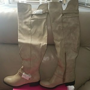 Thigh high flat boots by Shoedazzle